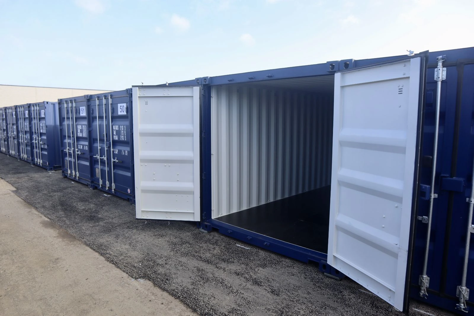 Large container with doors open for drive-up access
