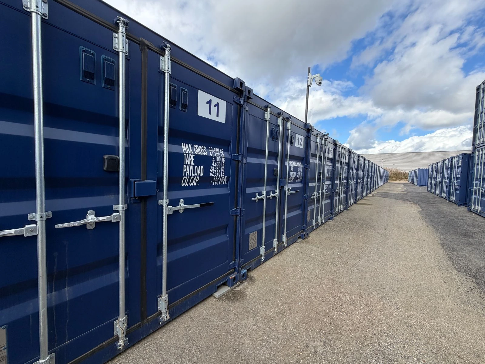 Row of large ground-level containers