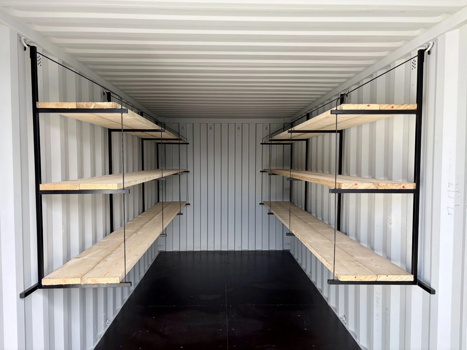 Large container fitted with double shelving